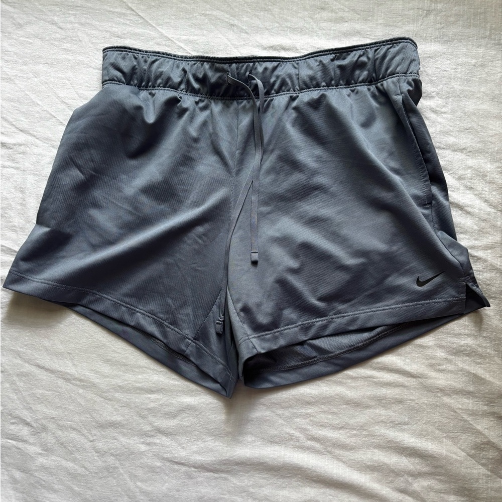 Nike dusty blue long shorts with pockets